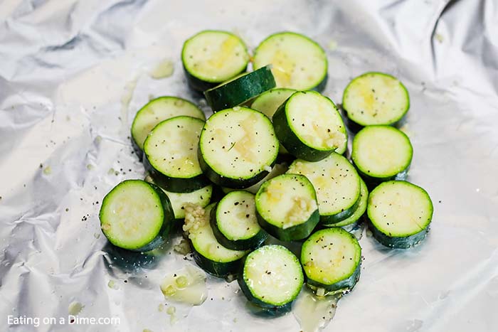 Grilled Zucchini Foil Pack Recipe is the easiest side dish and clean up is a breeze.  The veggies have the best flavor from the grill and it is so frugal.
