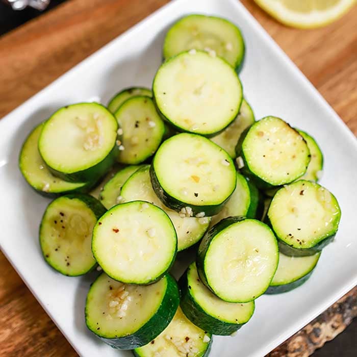 Grilled Zucchini on a white plate