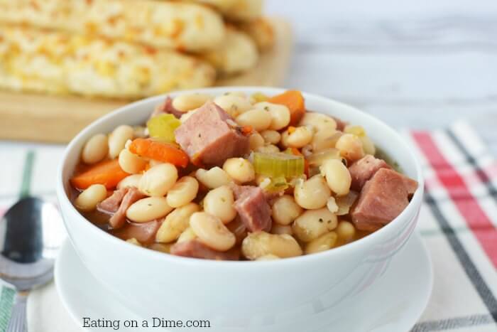 Ham and Bean Soup cooked in an Instant Pot in a white bowl.