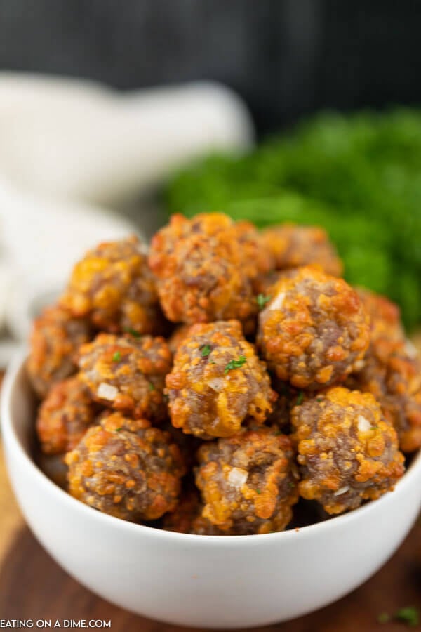 Close up image of a bowl of sausage balls. 