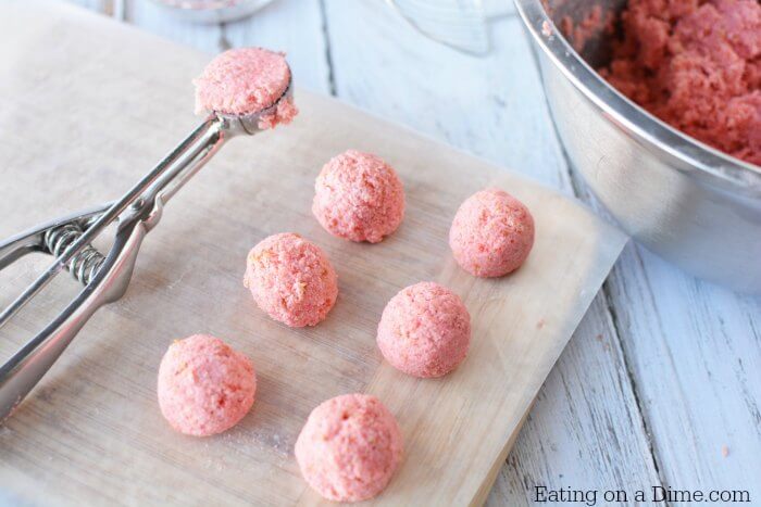 The cake and frosting mixture combined together and rolled into balls with a cookie scoop 