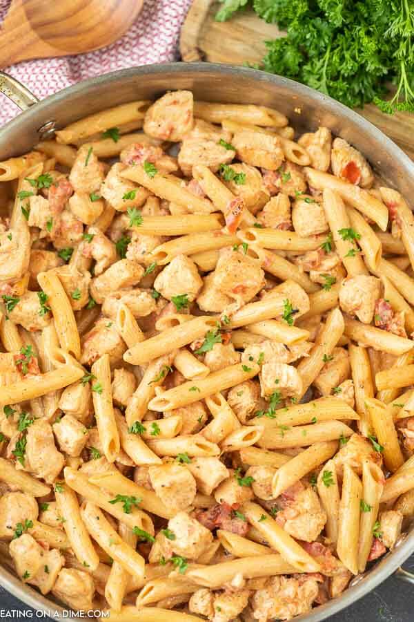 Creamy Cajun Chicken Pasta in a large silver skillet 