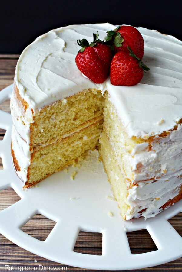Vanilla Cake with Buttercream Frosting and strawberries