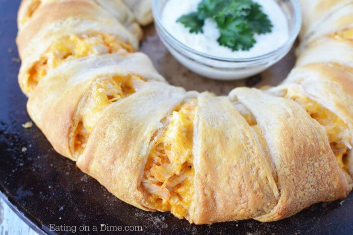 Close up Buffalo Chicken Crescent Ring with a ranch dip
