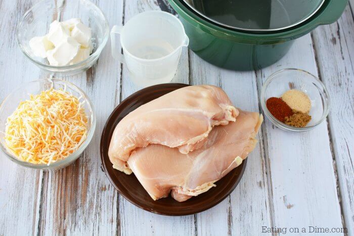 photo of ingredients- chicken, seasonings, cream cheese, shredded cheese.