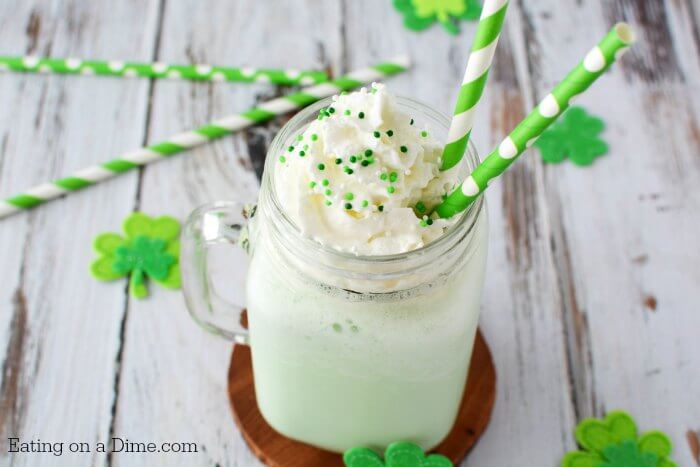 You can make Mcdonald's Shamrock Shake Recipe for kids at home! We love copycat recipes & this shamrock shake recipe is easy. This McDonalds milkshake will be a hit. #eatingonadime #shakerecipes #shamrockshake