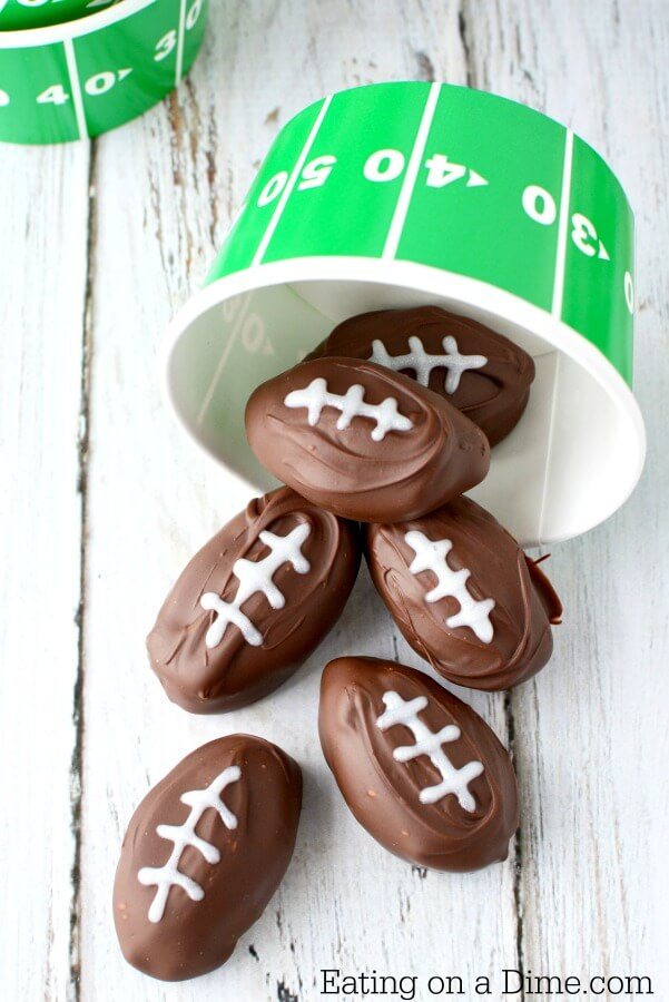 Enjoy these Football Shaped Chocolate Peanut Butter Balls that are perfect for the big game! Creamy and delicious and oh so cute! Get all the tips here. 