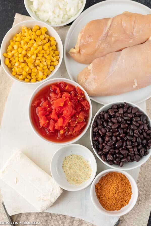 Ingredients needed - chicken breast, black beans, corn, onion, diced tomatoes, chicken broth, taco seasoning, garlic salt, cream cheese, cheese