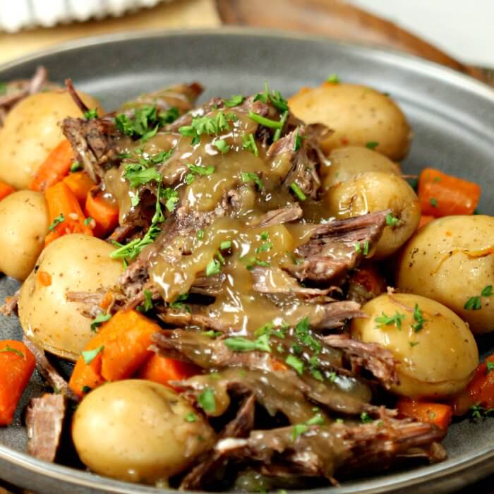 This Instant Pot Roast Dinner Recipe is amazing! It is truly the best Pressure Cooker Pot Roast Dinner recipe. The gravy is so delicious. You will see why it's the Best Pot Roast Recipe for the Instant Pot. The veggies are packed with flavor! Yum! 