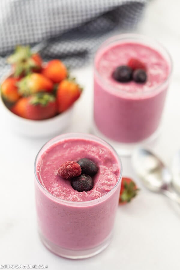 closeup of 2 glasses with smoothies.