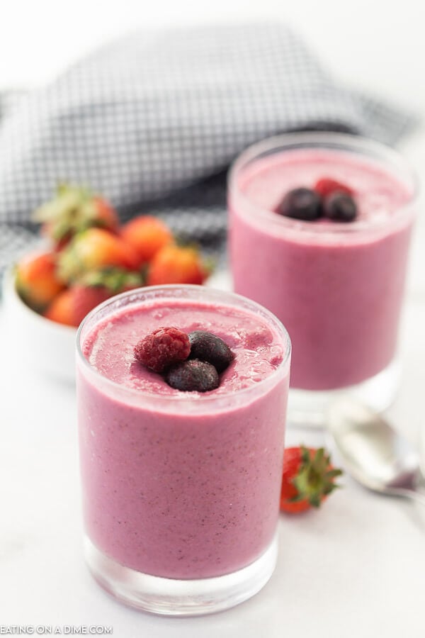 closeup of 2 glasses with smoothies.