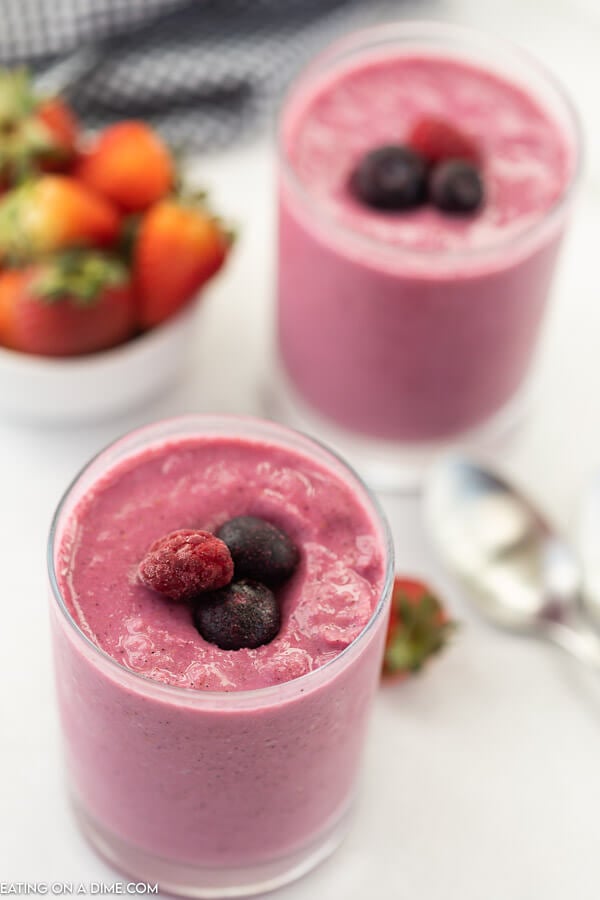 closeup of 2 glasses with smoothies.