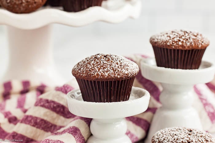 Close up image of mini brownie bites on cake stand