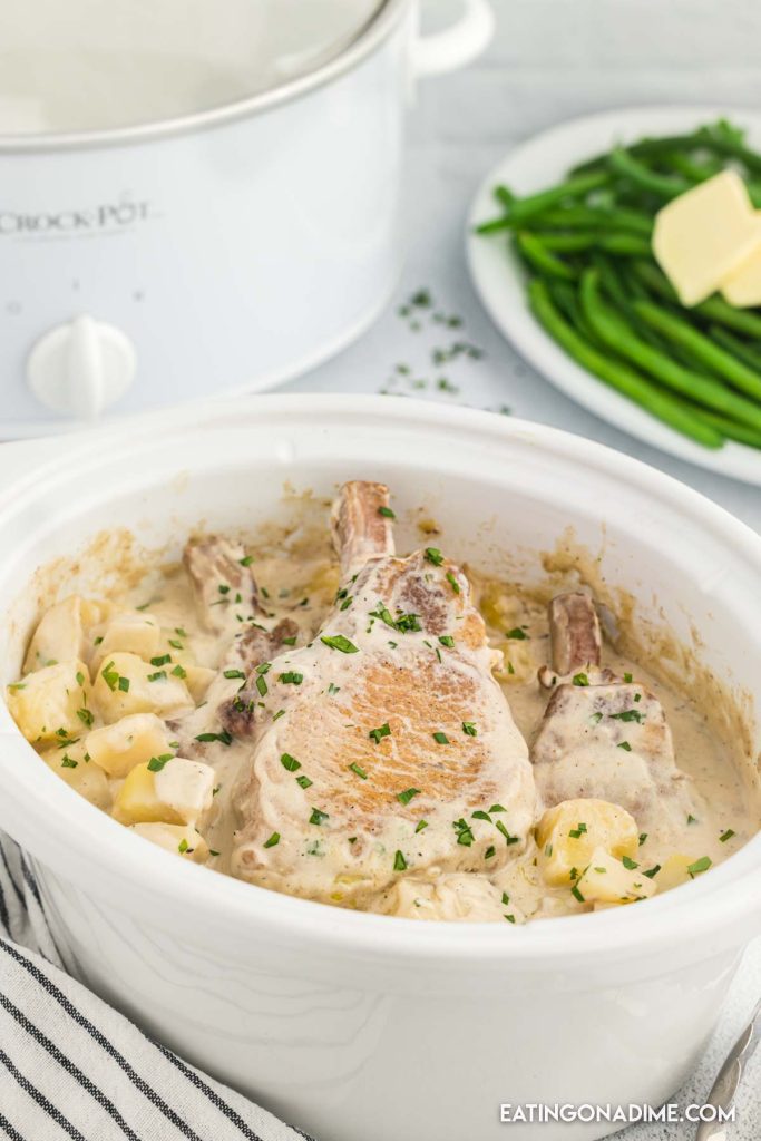 Cowboy Pork Chops with potatoes in the slow cooker