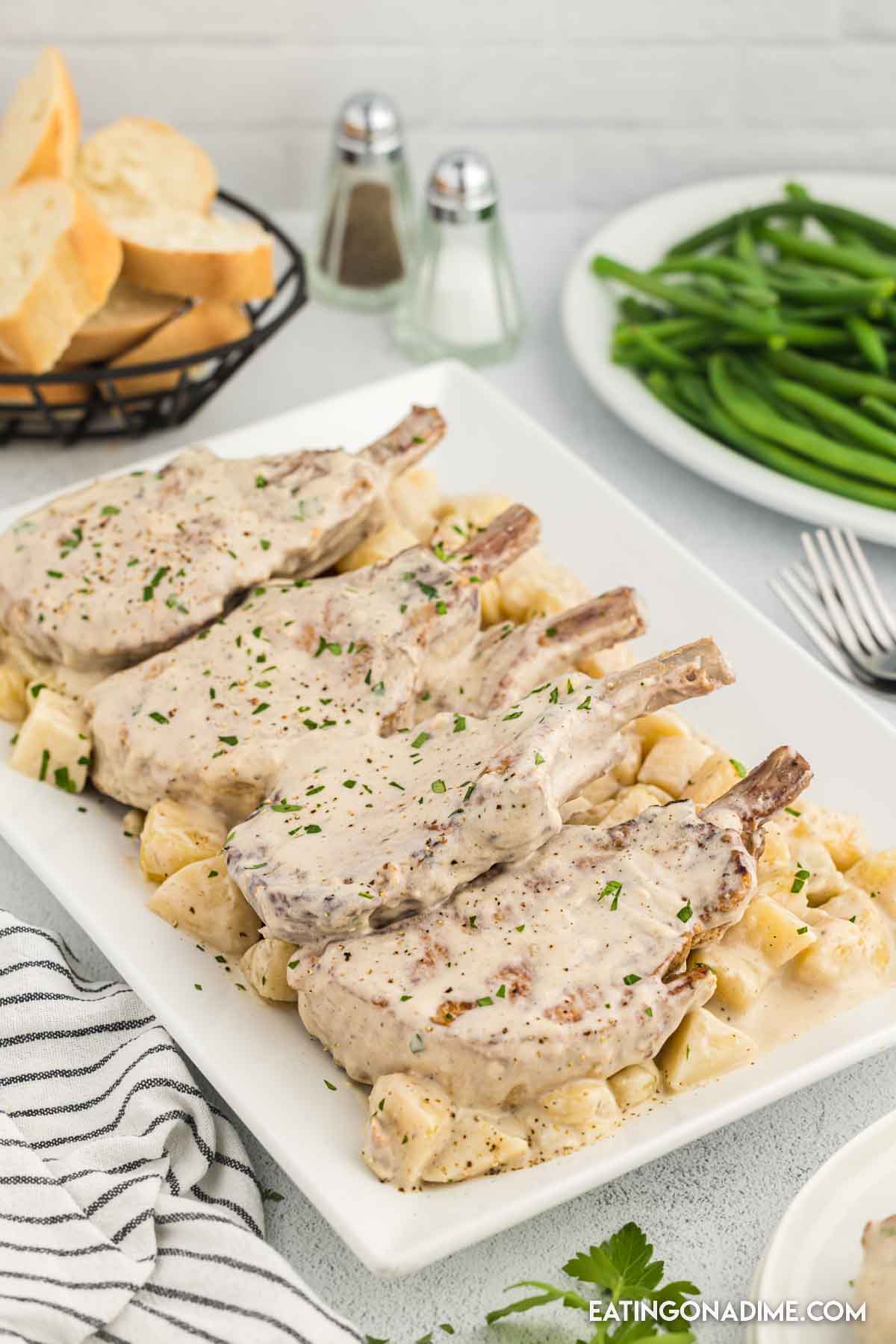 Cowboy pork chops with potatoes on a platter