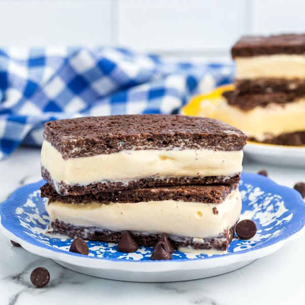Close up image of stacked homemade ice cream sandwiches on a plate