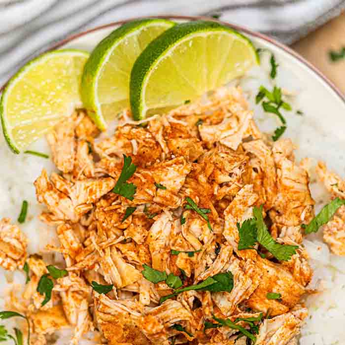 This Cilantro Lime Chicken Crockpot Recipe is packed with flavor! Slow cooker cilantro lime chicken is a meal the whole family will enjoy!