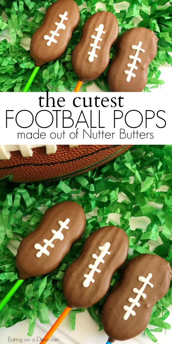 Close up image of three football cookie pops on green confetti. 