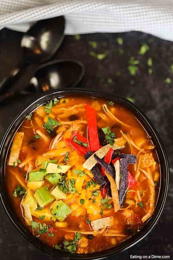 Crockpot Chicken Tortilla Soup Recipe is the best comfort food and it is so simple to make in the slow cooker. This recipe can feed a crowd!