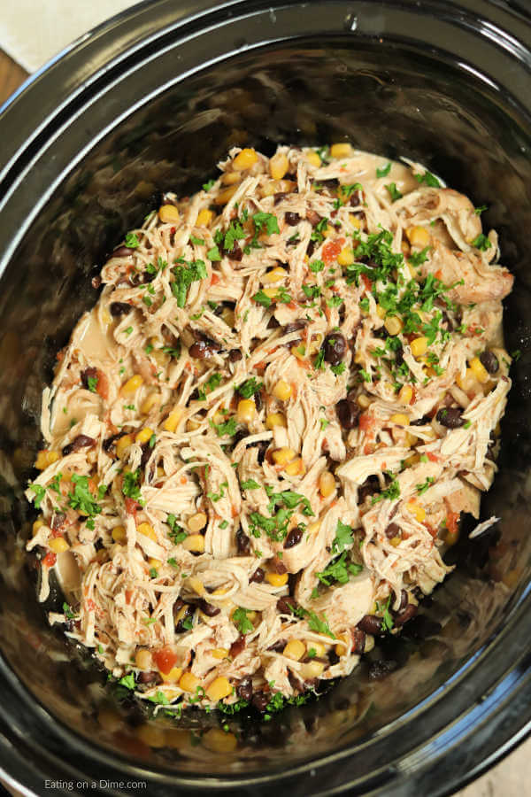 Crock Pot Fiesta Chicken Recipe is perfect for tacos, salads, burrito bowls and more! Crock pot Fiesta lime Chicken is creamy and tasty and sure to impress. 