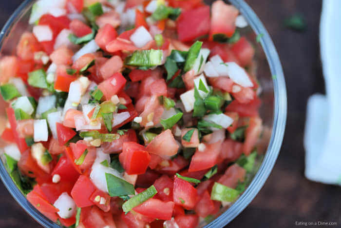 Close up image of pico de gallo in a bowl. 