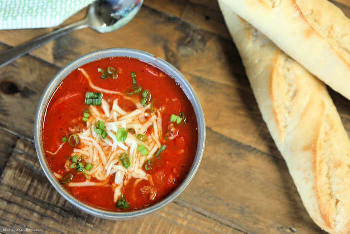 Everything you love about pizza is in this tasty Crock Pot Pizza Soup Recipe. If your family loves pizza as much as we do, they're going to love pizza soup.