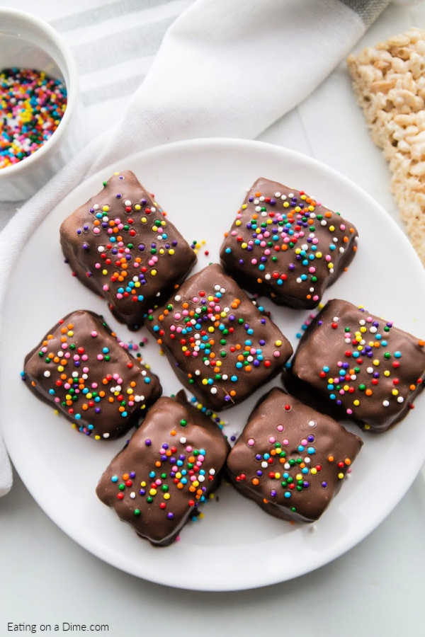 plate of chocolate covered rice krispies treats
