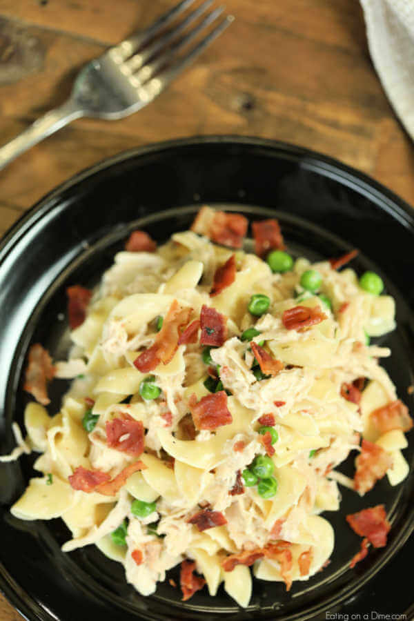 Crock Pot Chicken Casserole Recipe is creamy and delicious. It is loaded with cream cheese, bacon and ranch flavor that your family will go crazy for!