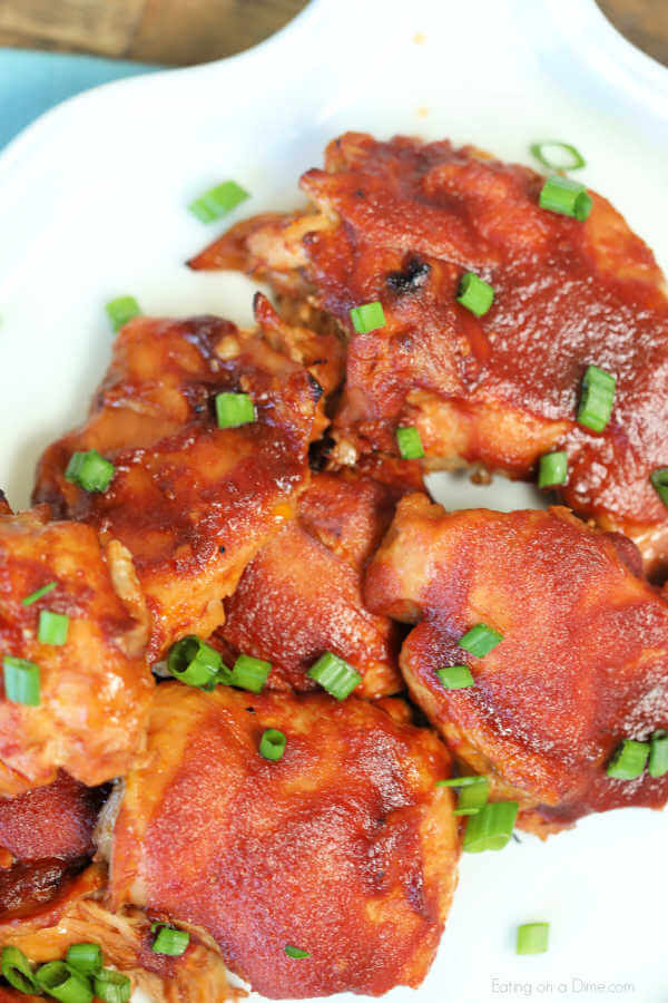 Crock Pot Sticky Chicken has a delicious brown sugar and tomato sauce glaze that will have you scraping the bowl clean. This sticky chicken is the best!