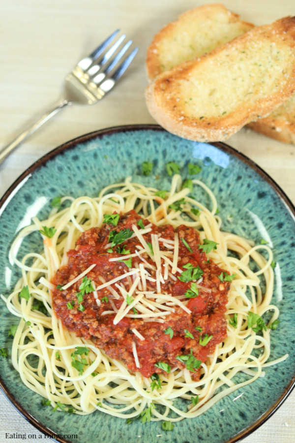Enjoy Instant Pot Bolognese Sauce Recipe in minutes thanks to this easy recipe. Get dinner on the table in under 20 minutes for a hearty meal. 