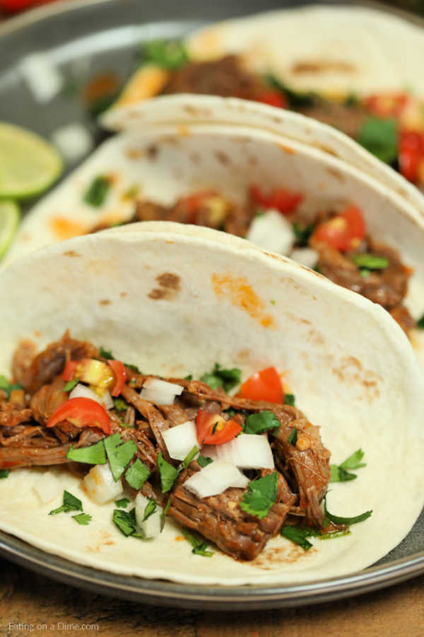 Crock Pot Beef Barbacoa Recipe is a tasty dinner idea with tender beef seasoned to perfection. Dinner will be a breeze with this easy slow cooker meal. 
