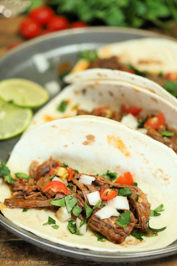 Crock Pot Beef Barbacoa Recipe is a tasty dinner idea with tender beef seasoned to perfection. Dinner will be a breeze with this easy slow cooker meal. 