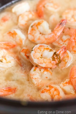 Cooking the shrimp scampi ingredients in the slow cooker