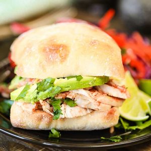Looking for an easy crock pot dinner? Then you have to make this slow cooker Mexican Chicken Avocado Sandwich. This crock pot recipe will surprise you!
