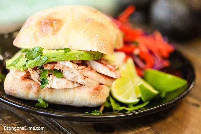 Looking for an easy crock pot dinner? Then you have to make this slow cooker Mexican Chicken Avocado Sandwich. This crock pot recipe will surprise you! 