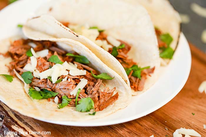These Mexican brisket crock pot tacos are perfect for a quick dinner or your next party. These slow cooker brisket tacos are a quick and easy dinner recipe. 