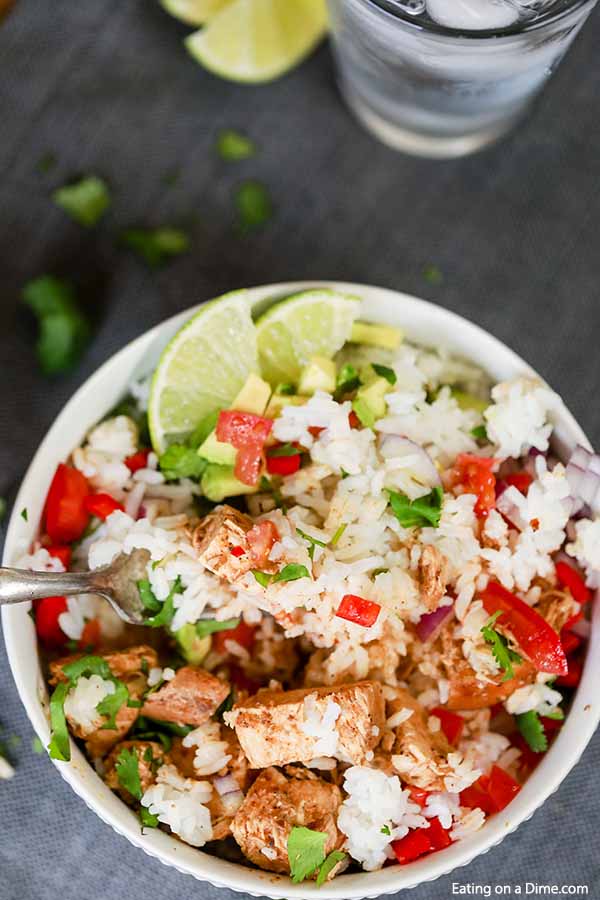 Enjoy your favorite chicken bowl with this Crock Pot Chipotle Chicken Bowl Recipe. Everyone can customize their bowl to their liking for the perfect meal.