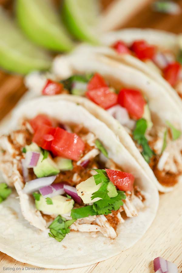 These crock pot chipotle chicken tacos are quick and easy to make but taste delicious. Everyone enjoys this great adobo sauce slow cooker mexican recipe. 