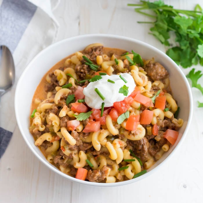 Crock pot beef taco pasta in a bowl. 