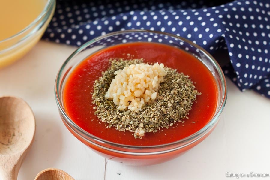 Tomato sauce and seasoning in a bowl