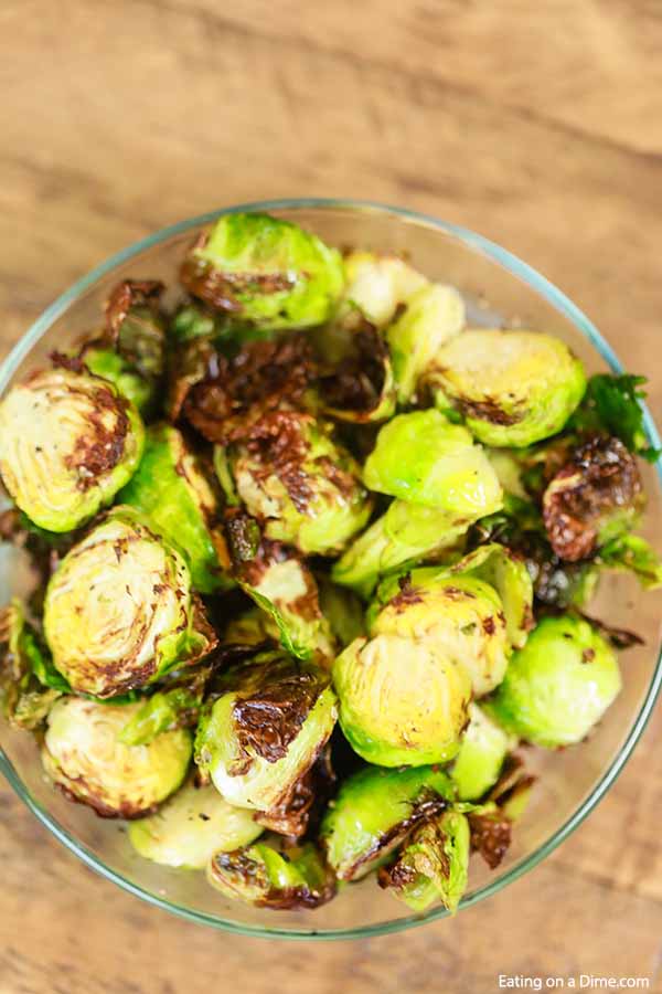 Air Fryer Roasted Brussel Spouts in a glass bowl