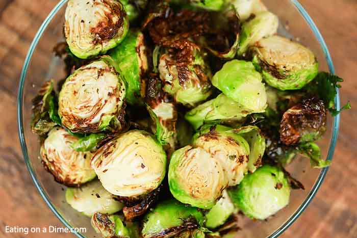 Air Fryer Roasted Brussel Spouts in a glass bowl