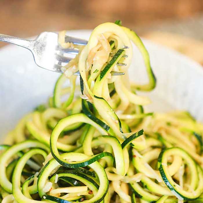 If you're looking for a healthy but yummy side dish, try Zucchini Noodles Recipe. Not only is this a tasty option, it is so easy to make this zoodle recipe.