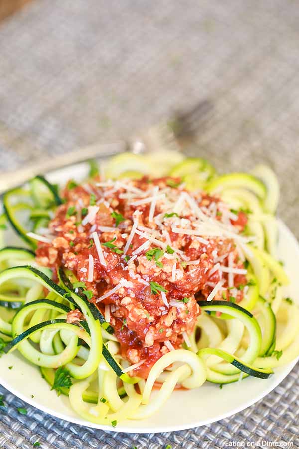 Enjoy Crock Pot Turkey Bolognese with Zoodles without any guilt because this meal is healthy and delicious.  Dinner is a breeze and so tasty!