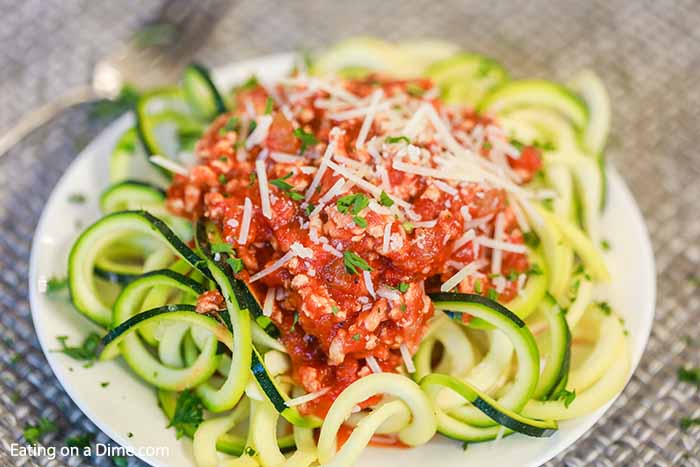 Enjoy Crock Pot Turkey Bolognese with Zoodles without any guilt because this meal is healthy and delicious.  Dinner is a breeze and so tasty!