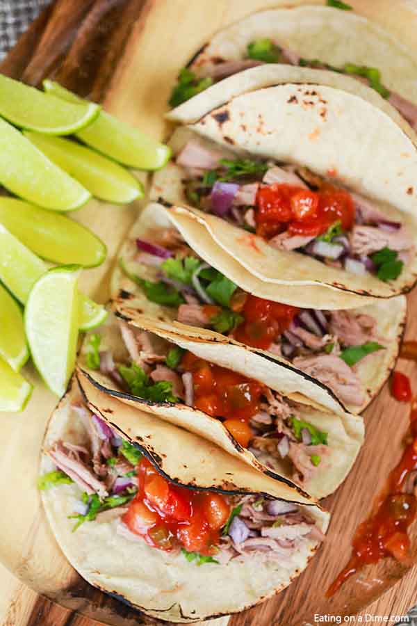 Tender pork and peach salsa come together for the best Crock Pot Pork Tenderloin Tacos. Enjoy this meal any night of the week thanks to the crock pot.