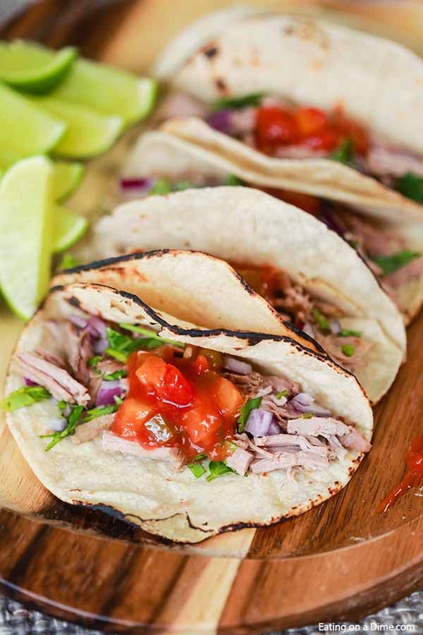 Tender pork and peach salsa come together for the best Crock Pot Pork Tenderloin Tacos. Enjoy this meal any night of the week thanks to the crock pot.