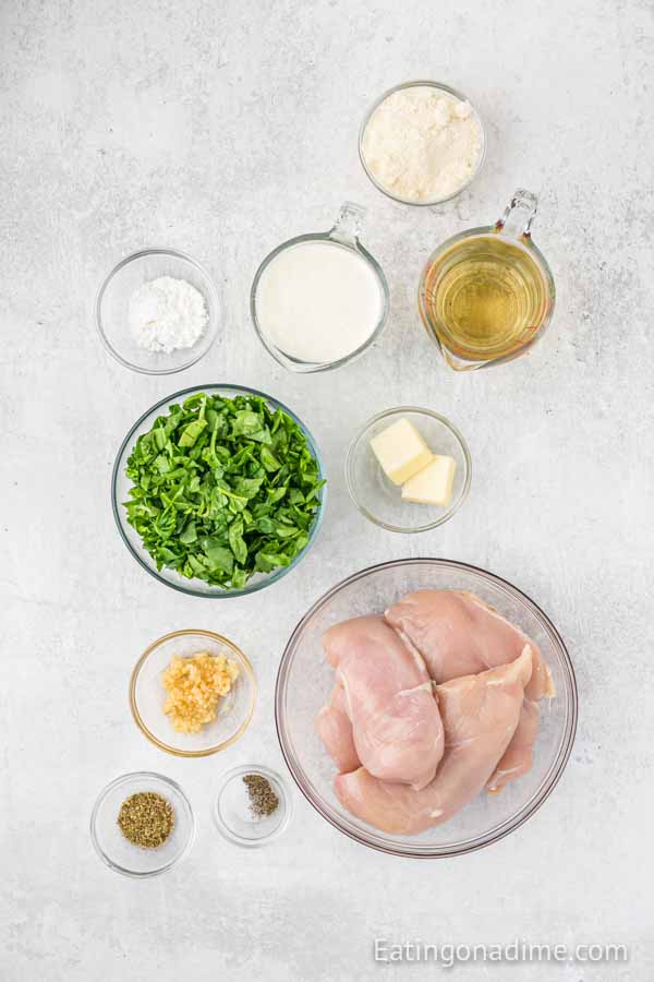 Ingredients needed - chicken breast, butter, white wine, minced garlic, salt and pepper, oregano, heavy whipping cream, cornstarch, parmesan cheese, fresh spinach