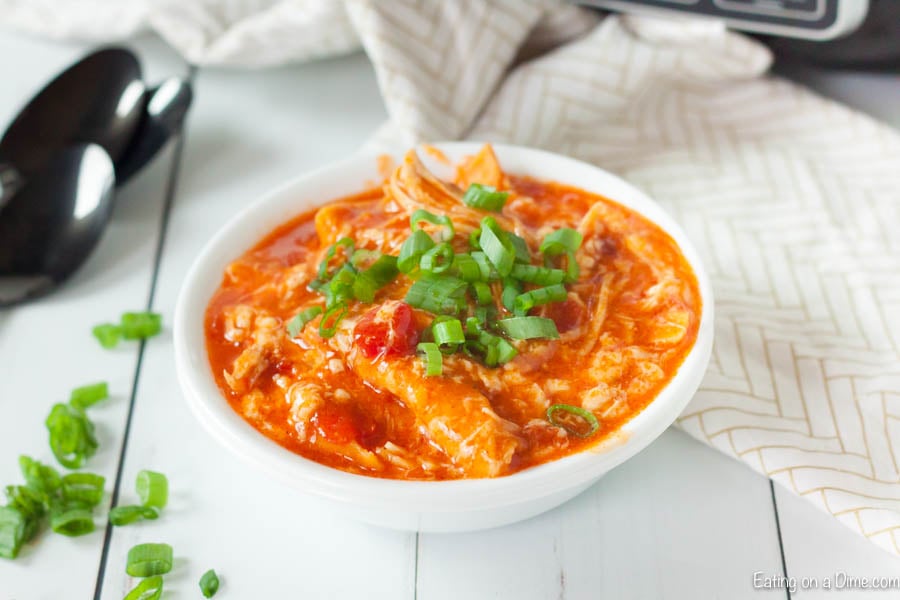 Buffalo chicken enchilada casserole in a white bowl