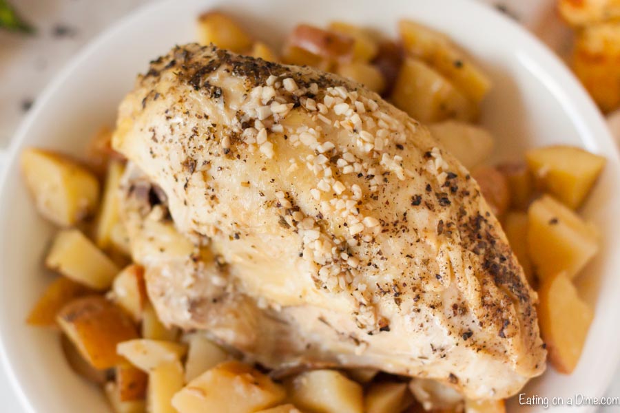 Slow Cooker Lemon Garlic Chicken Recipe is light and creamy with the tasty lemon sauce.  The tender potatoes and lemon garlic chicken combine perfectly. 